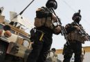 قوة أمنية تشن حملة اعتقالات لمسؤولين عراقيين
